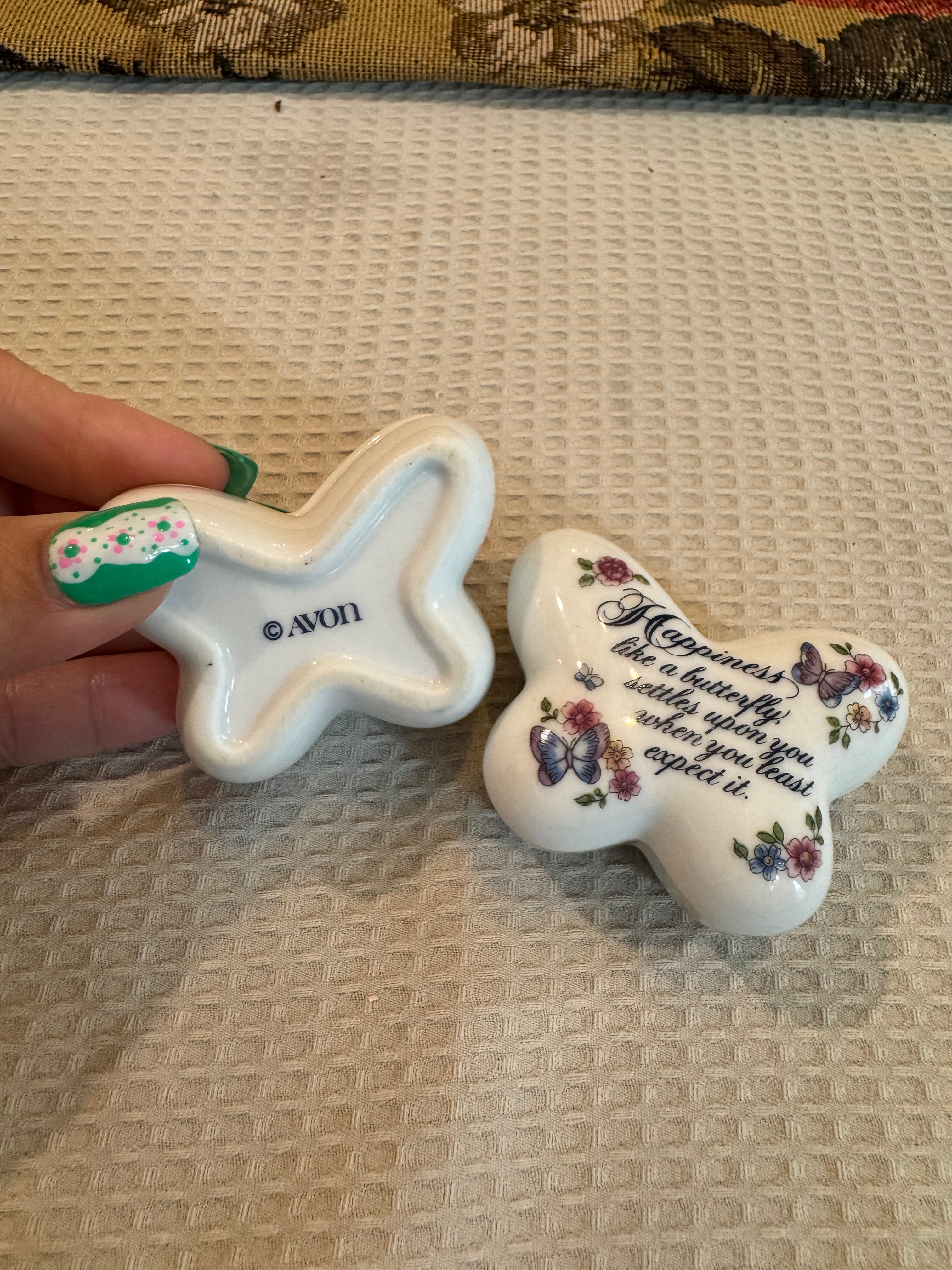 A pair of vintage 1974 Avon "Butterfly Fantasy" porcelain trinket boxes