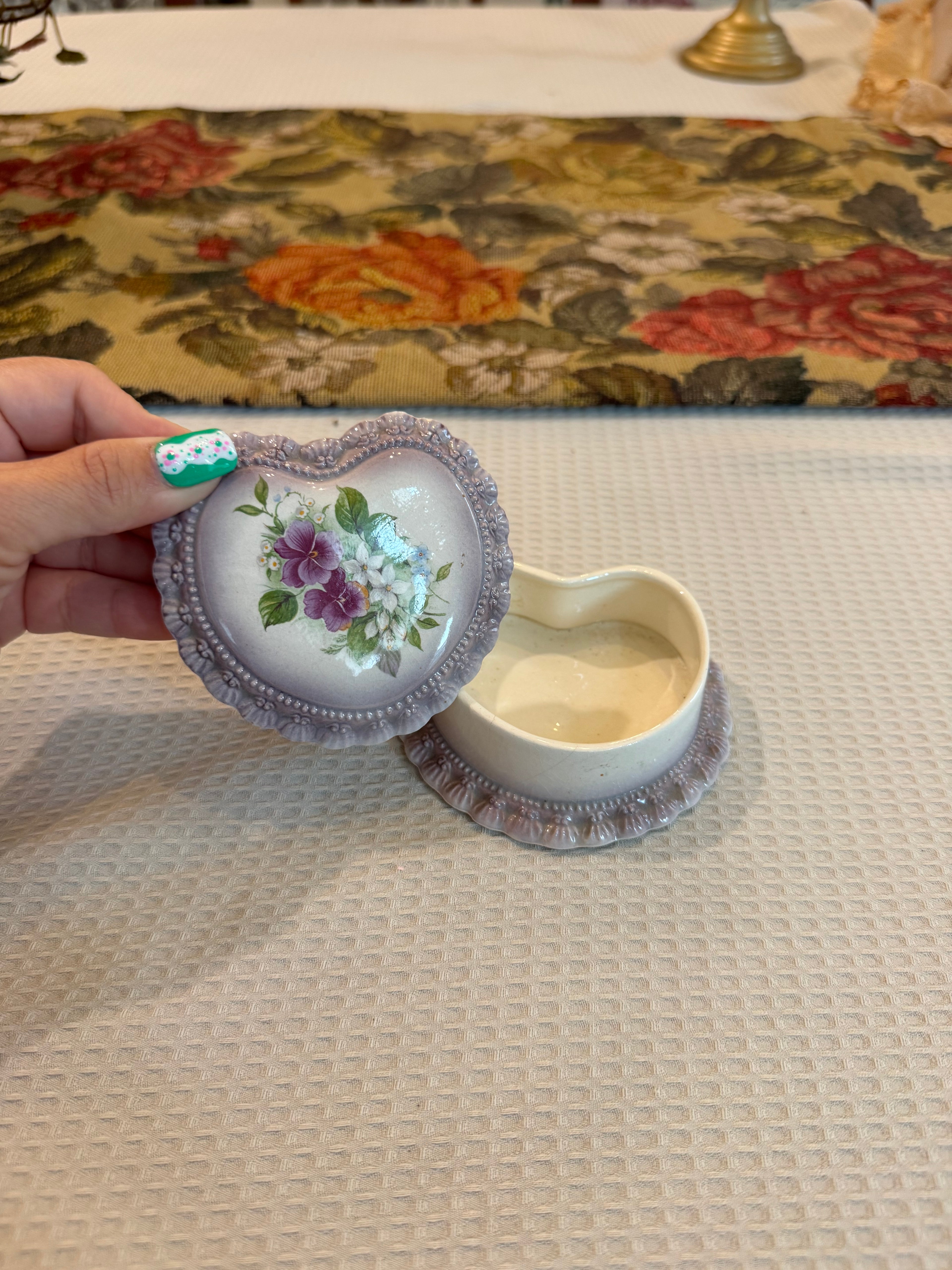 Vintage-style porcelain or ceramic heart-shaped trinket box