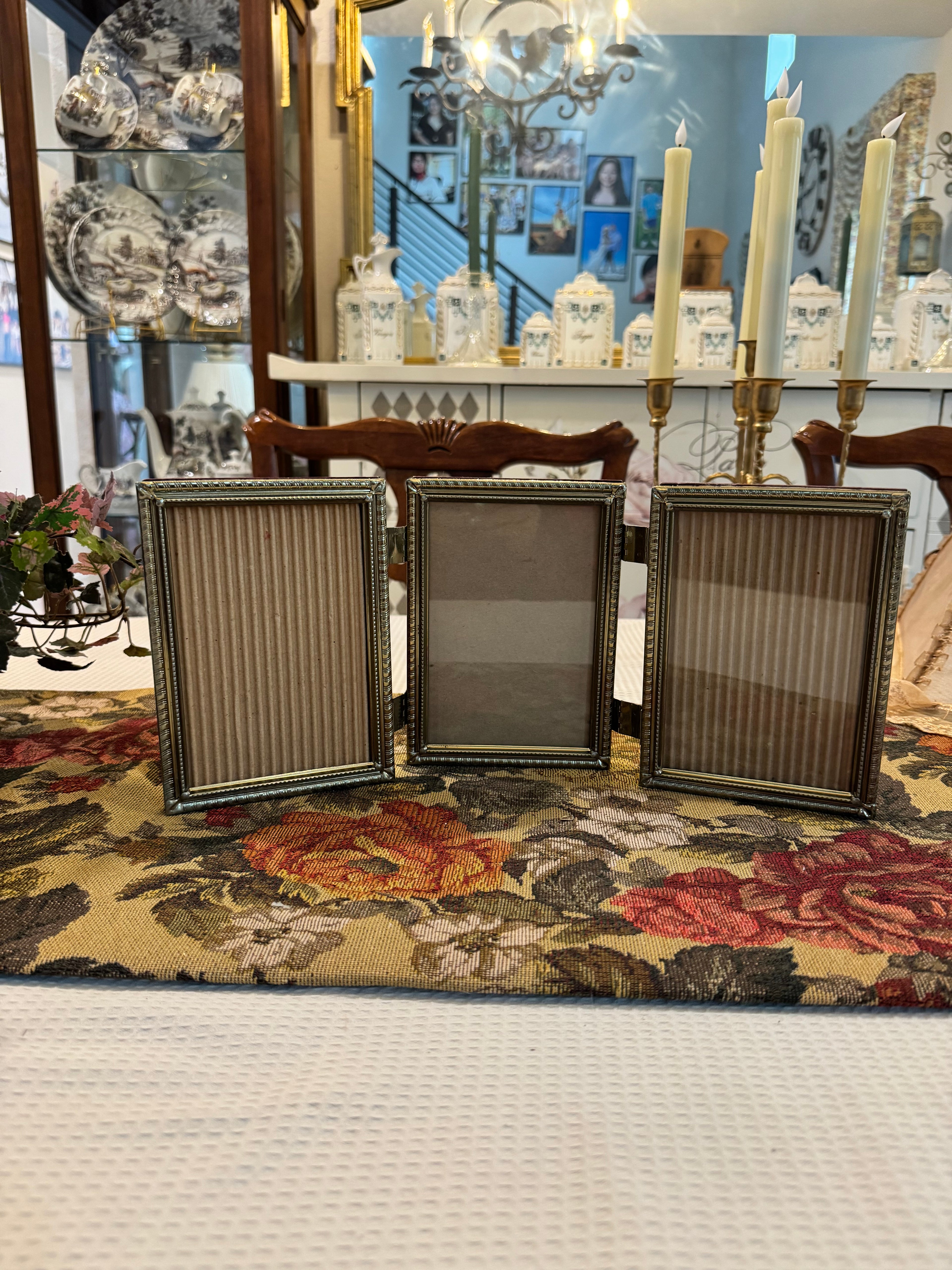 Hinged triple-photo frame