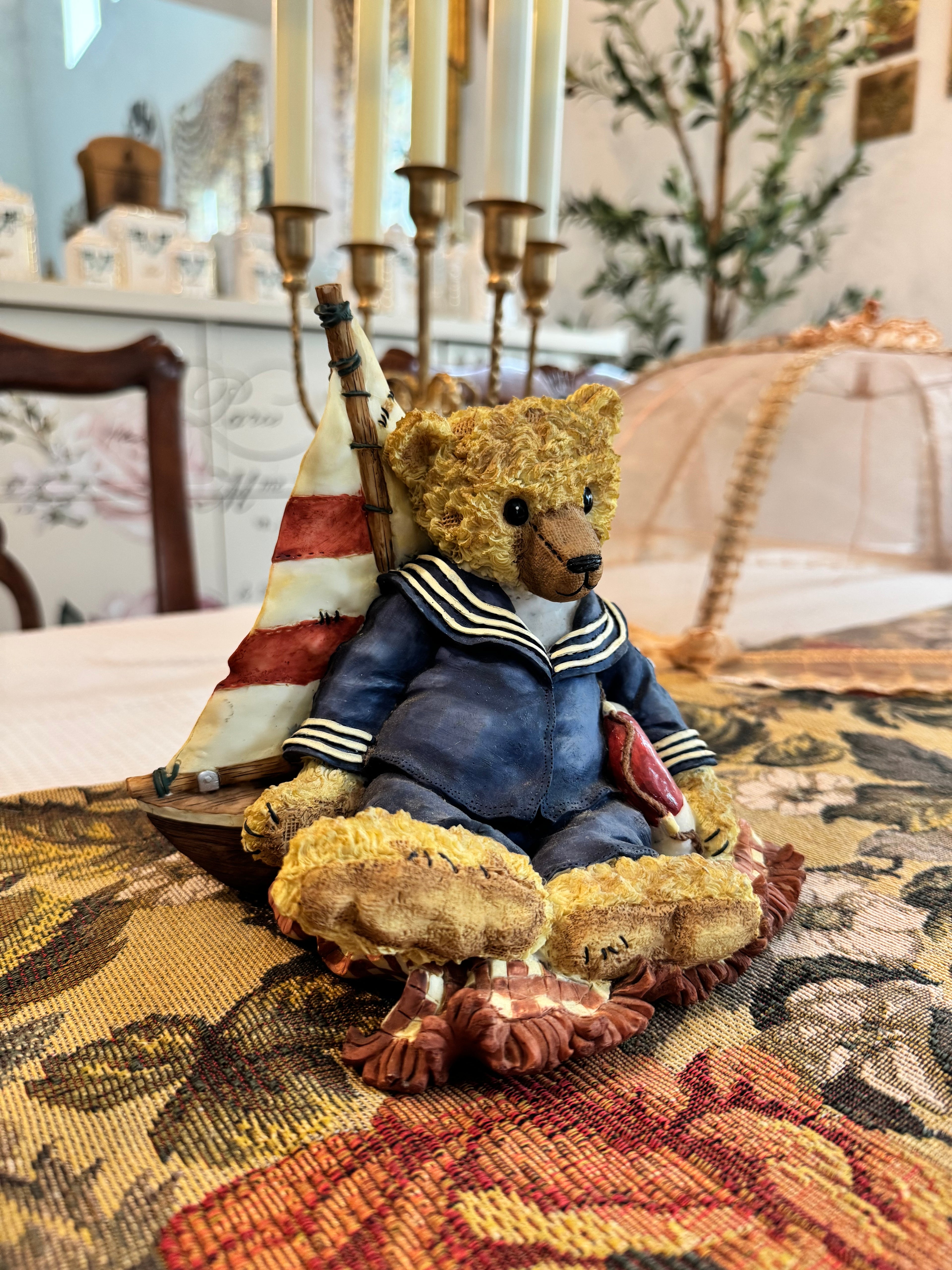 Vintage collectible musical sailor teddy bear figurine featuring a nautical theme.