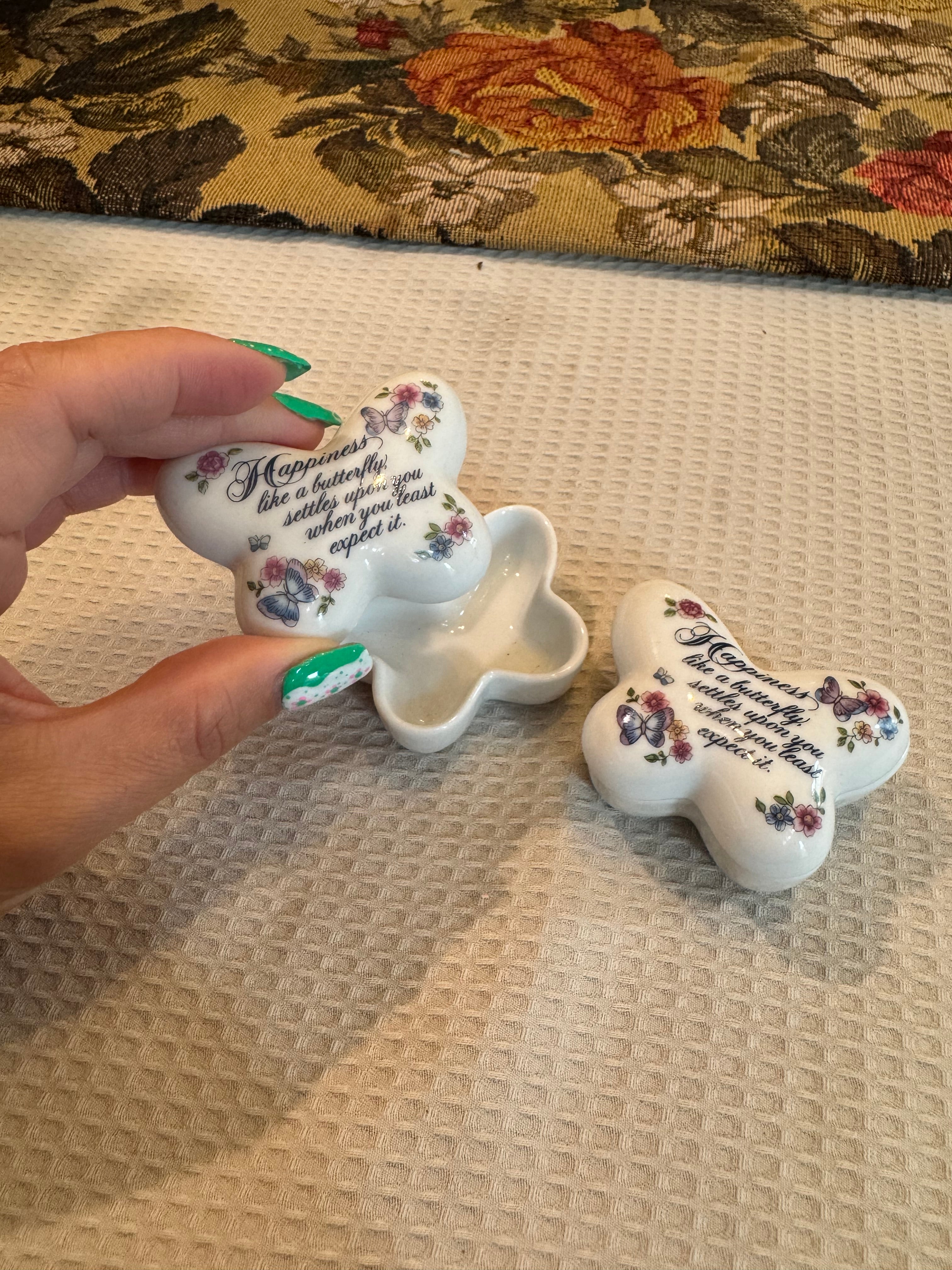 A pair of vintage 1974 Avon "Butterfly Fantasy" porcelain trinket boxes