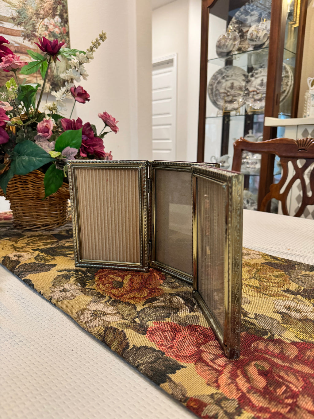Hinged triple-photo frame
