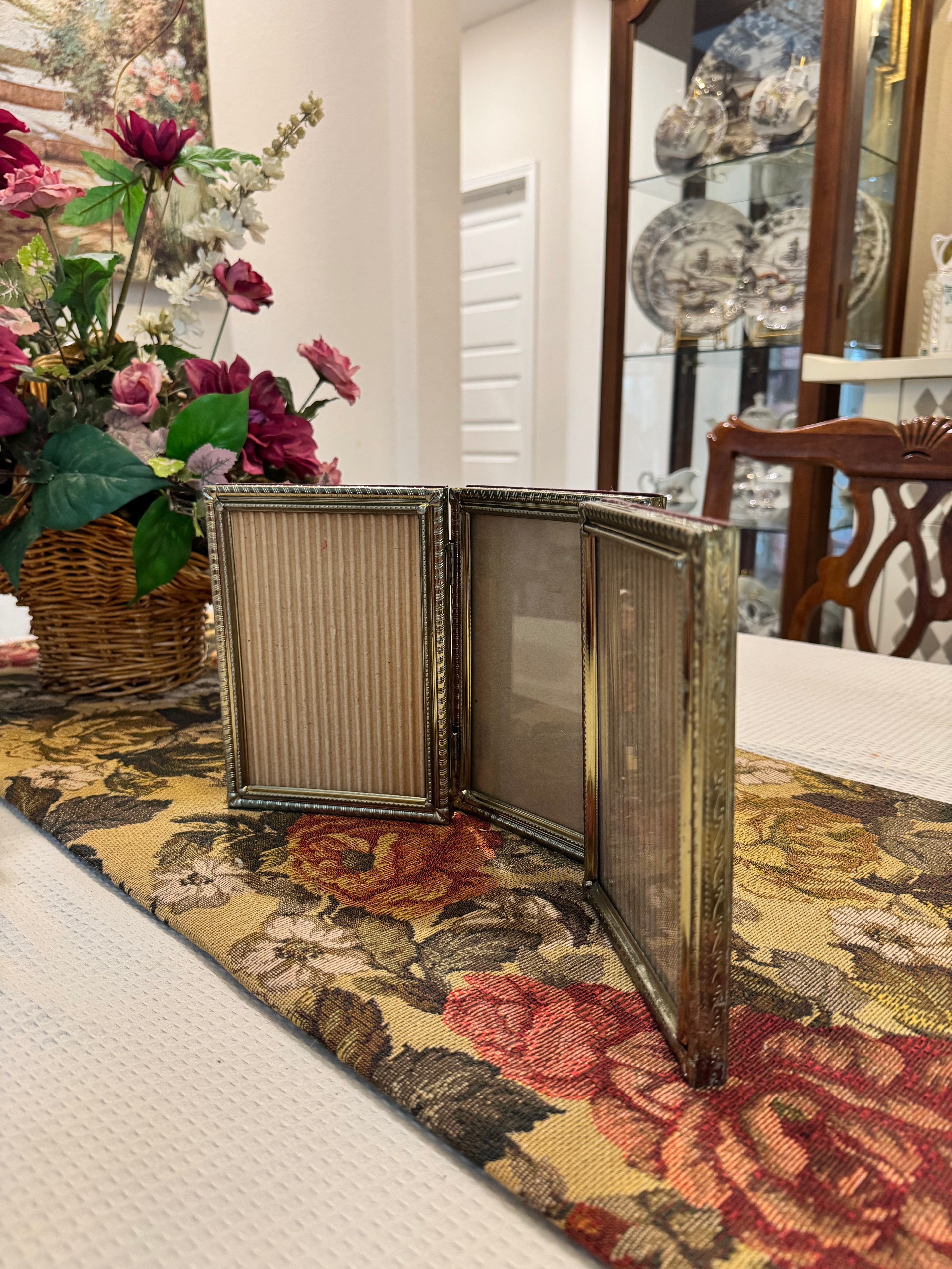 Hinged triple-photo frame