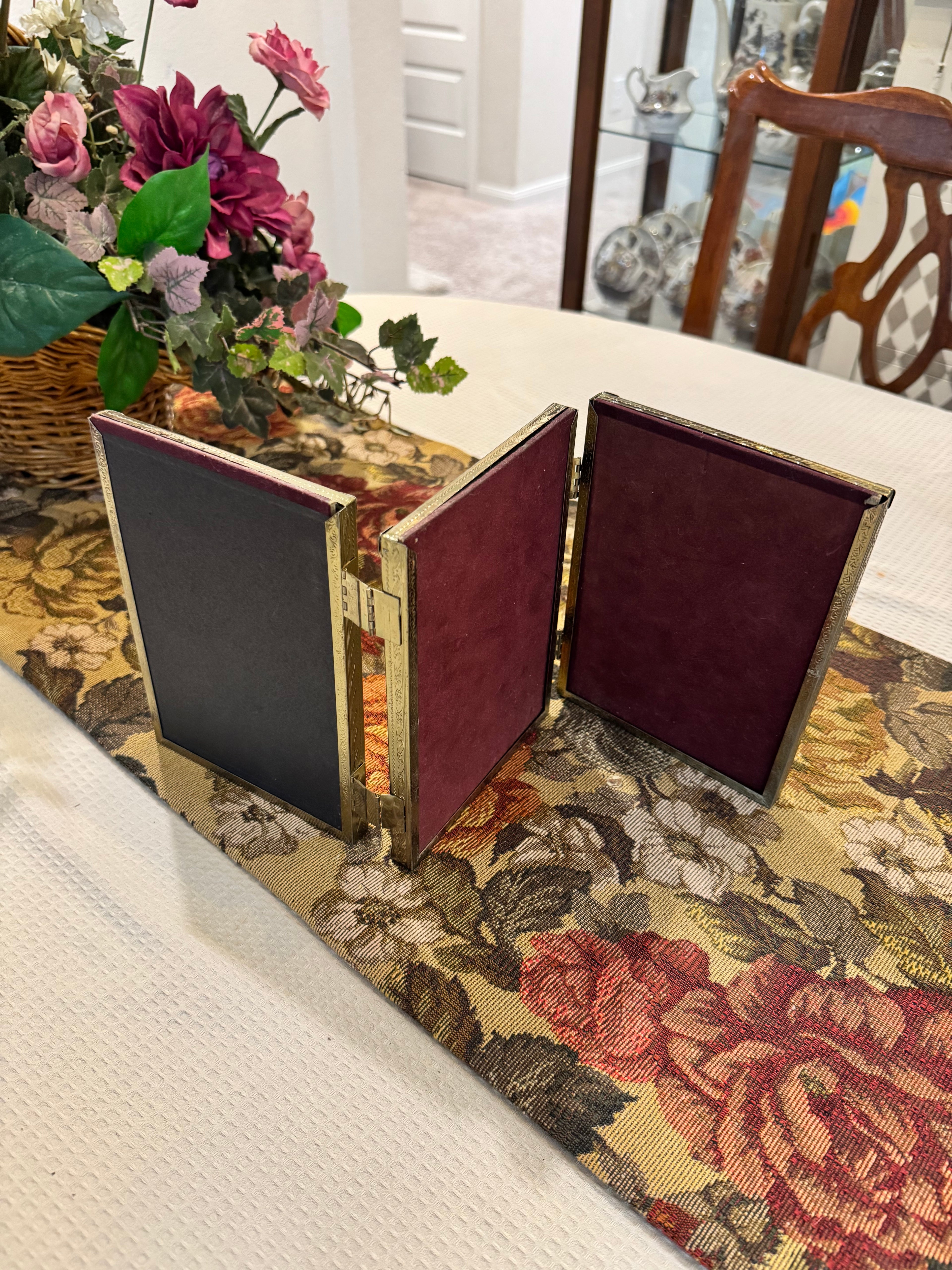 Hinged triple-photo frame