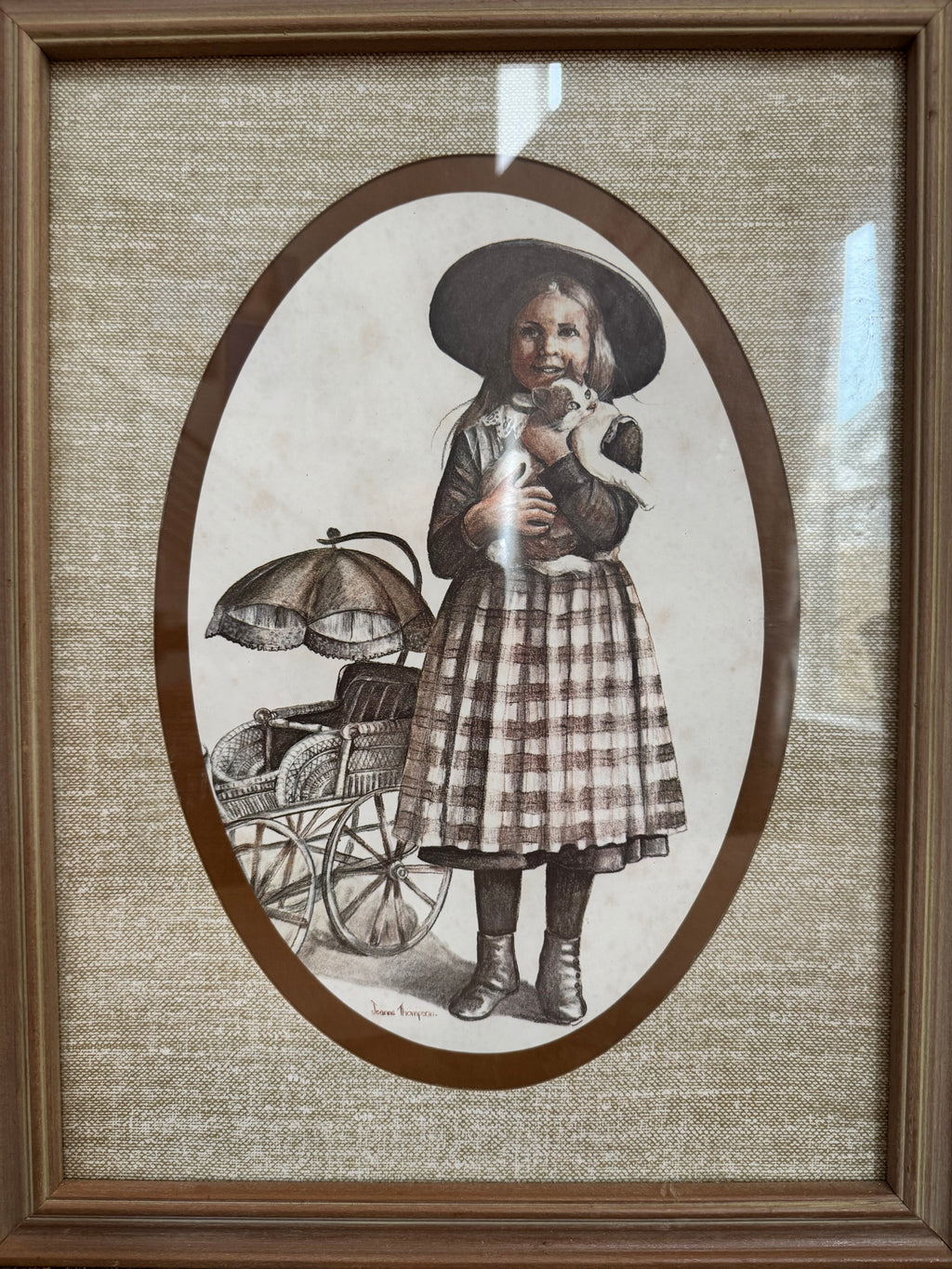 A pair of victorian framed prints boy and girl by artist Joanne Thompson