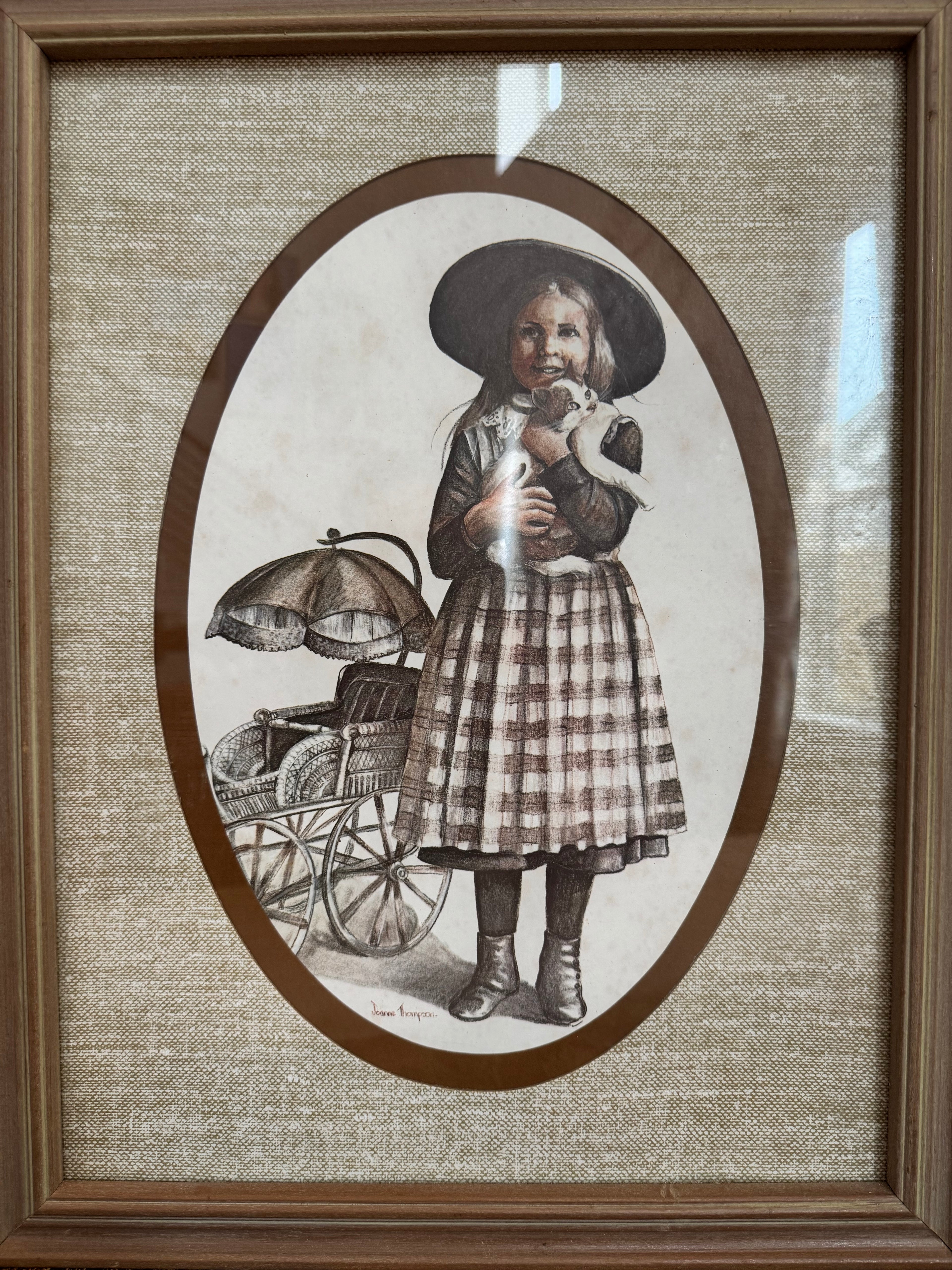 A pair of victorian framed prints boy and girl by artist Joanne Thompson