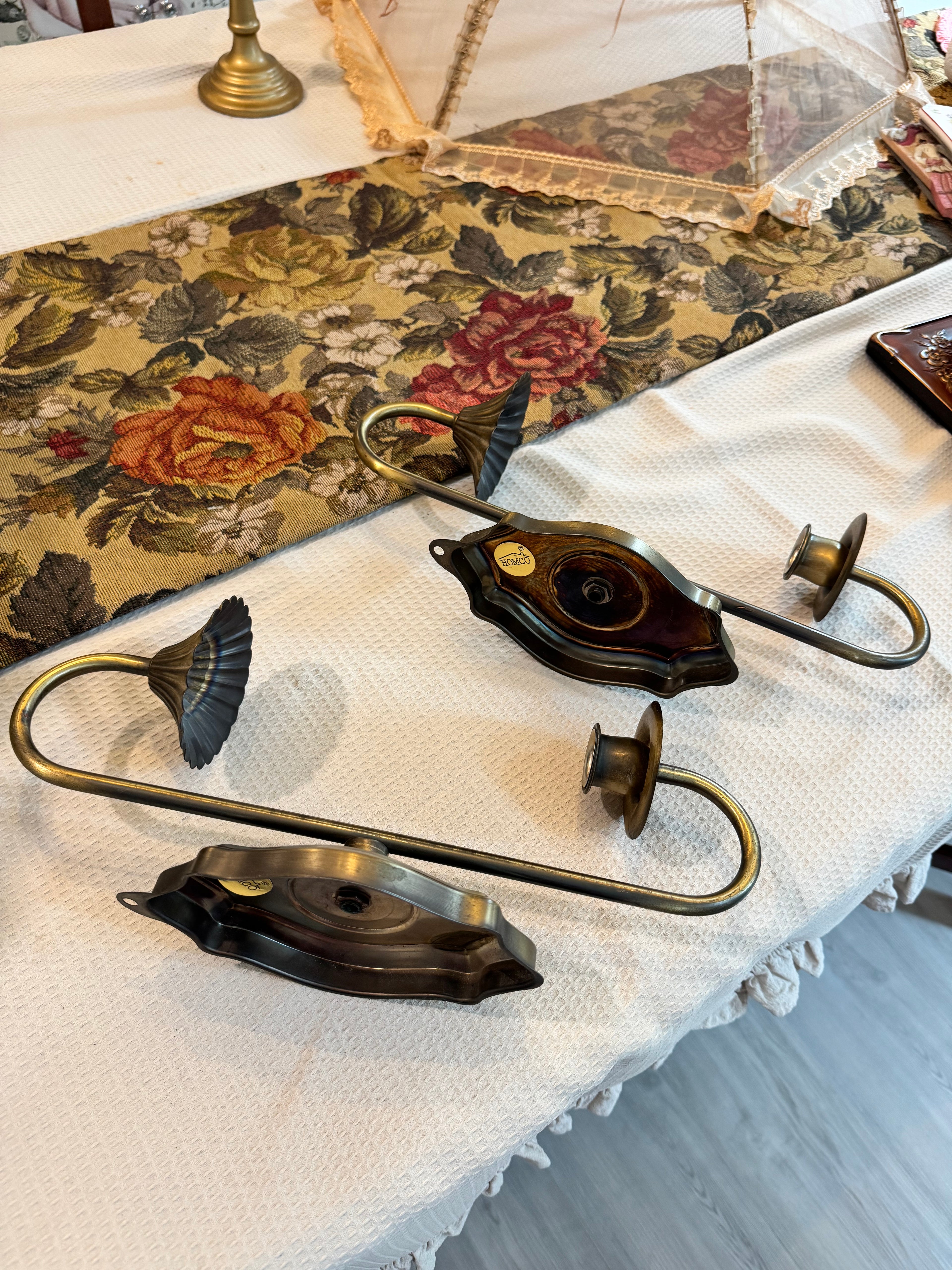 A pair of vintage MCM Homco brass hold metal wall sconce