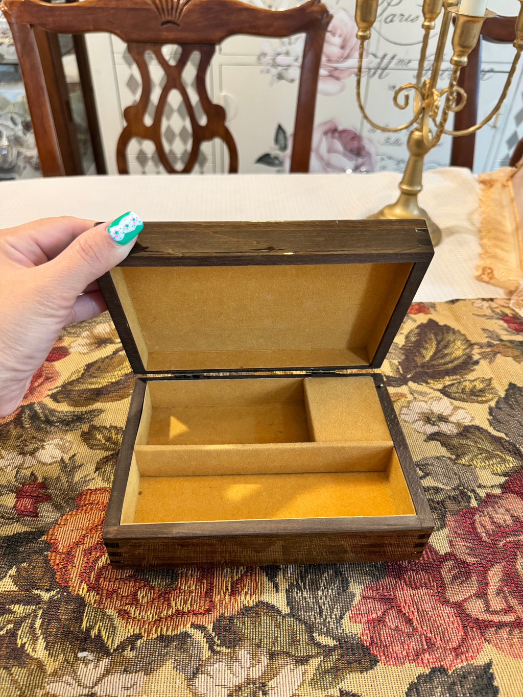 Wooden decorative musical jewelry box featuring a reproduction of the painting "The Wedding Register"