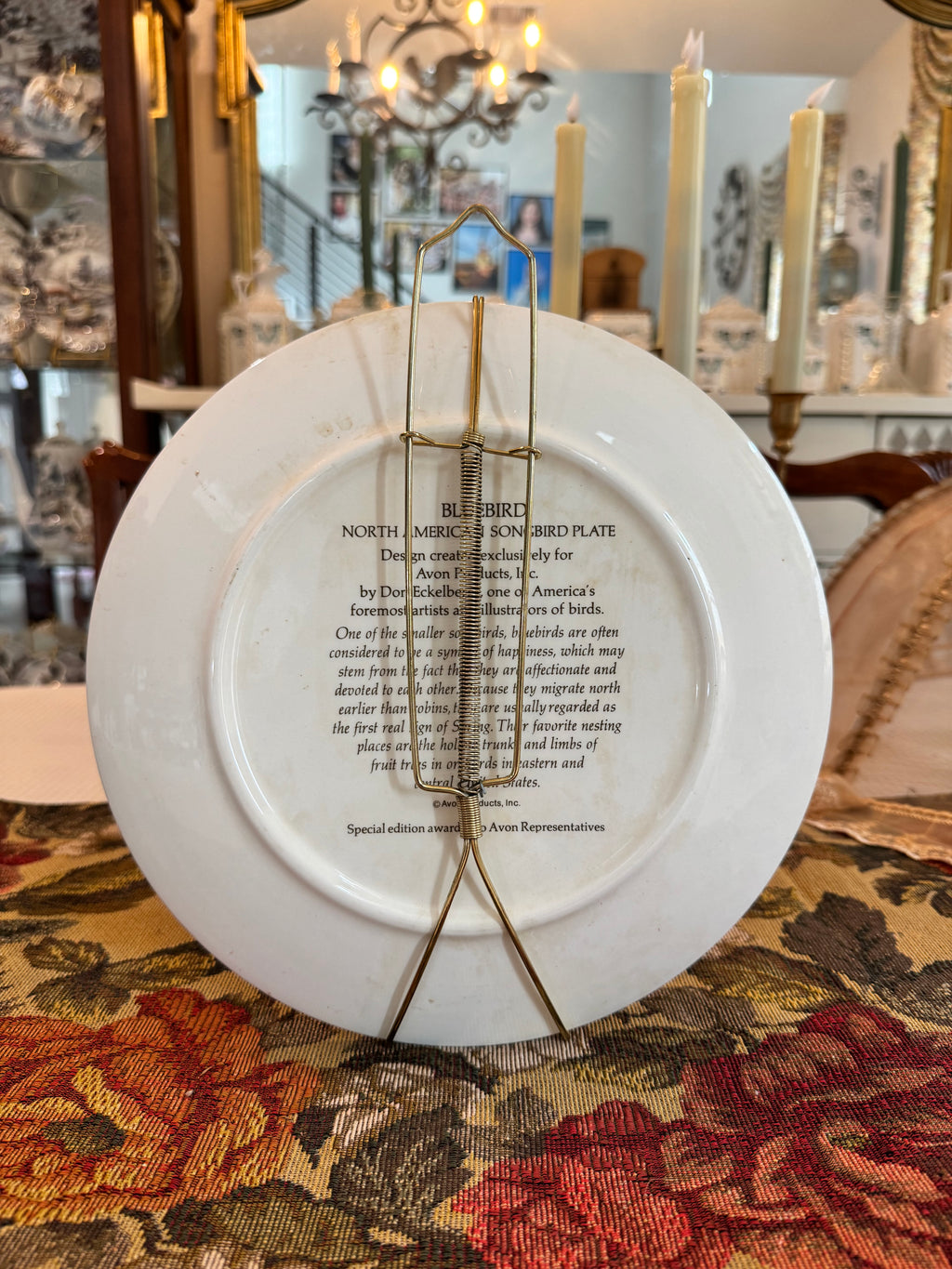 Collectible Avon North American Songbird Plate with a bluebird by artist Don Eckelberry.