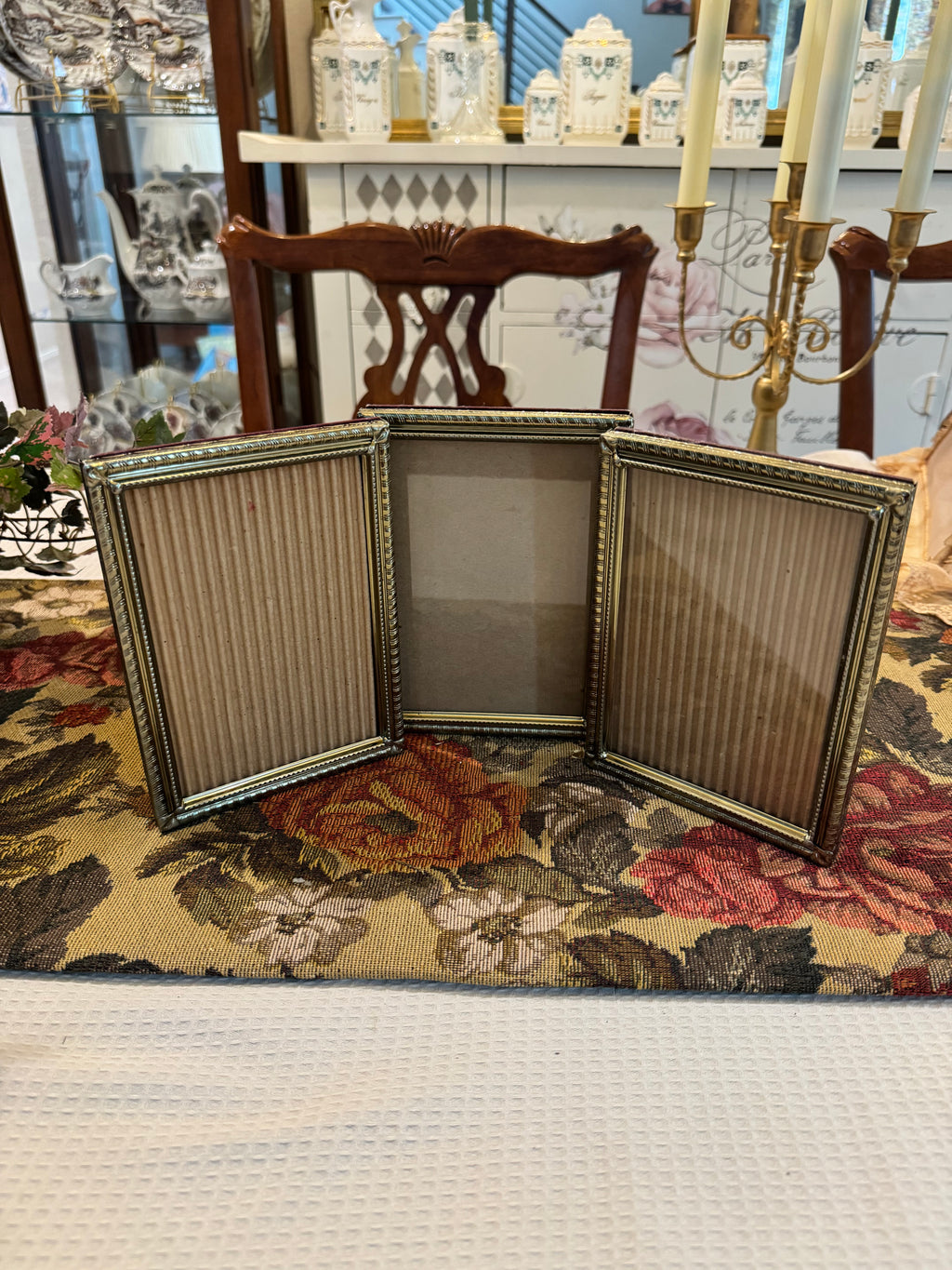 Hinged triple-photo frame