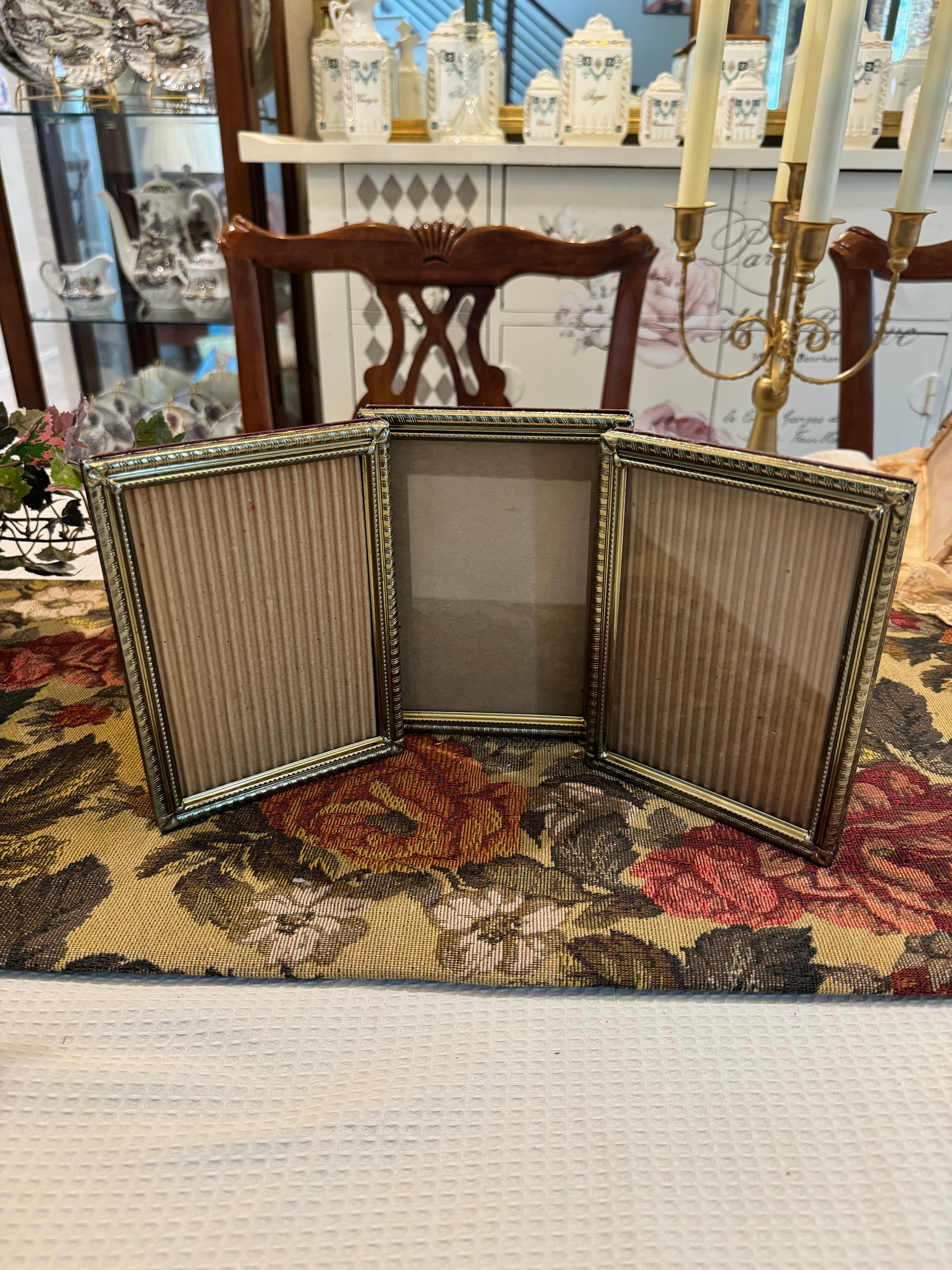 Hinged triple-photo frame