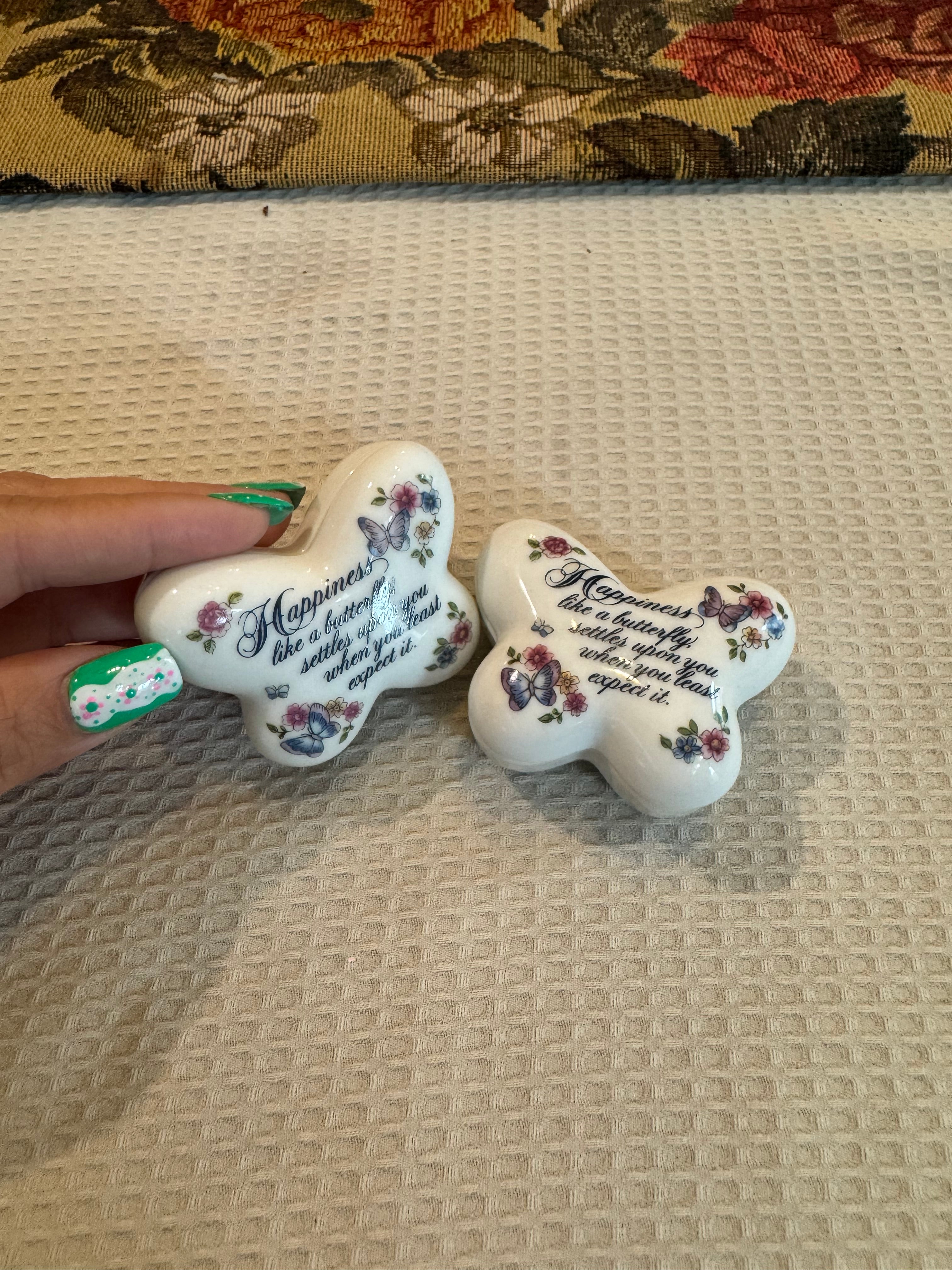 A pair of vintage 1974 Avon "Butterfly Fantasy" porcelain trinket boxes