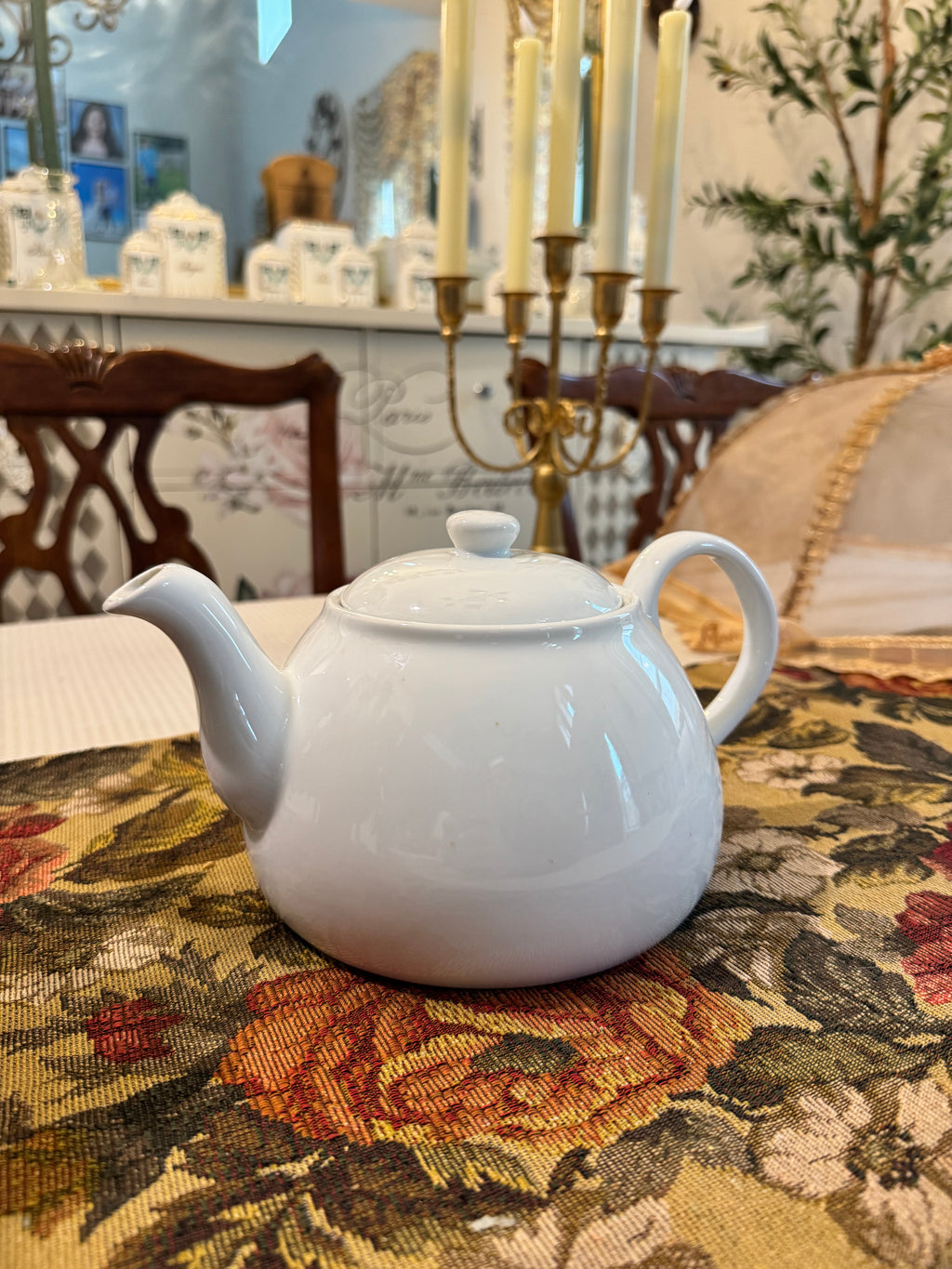 Threshold brand white porcelain teapot.