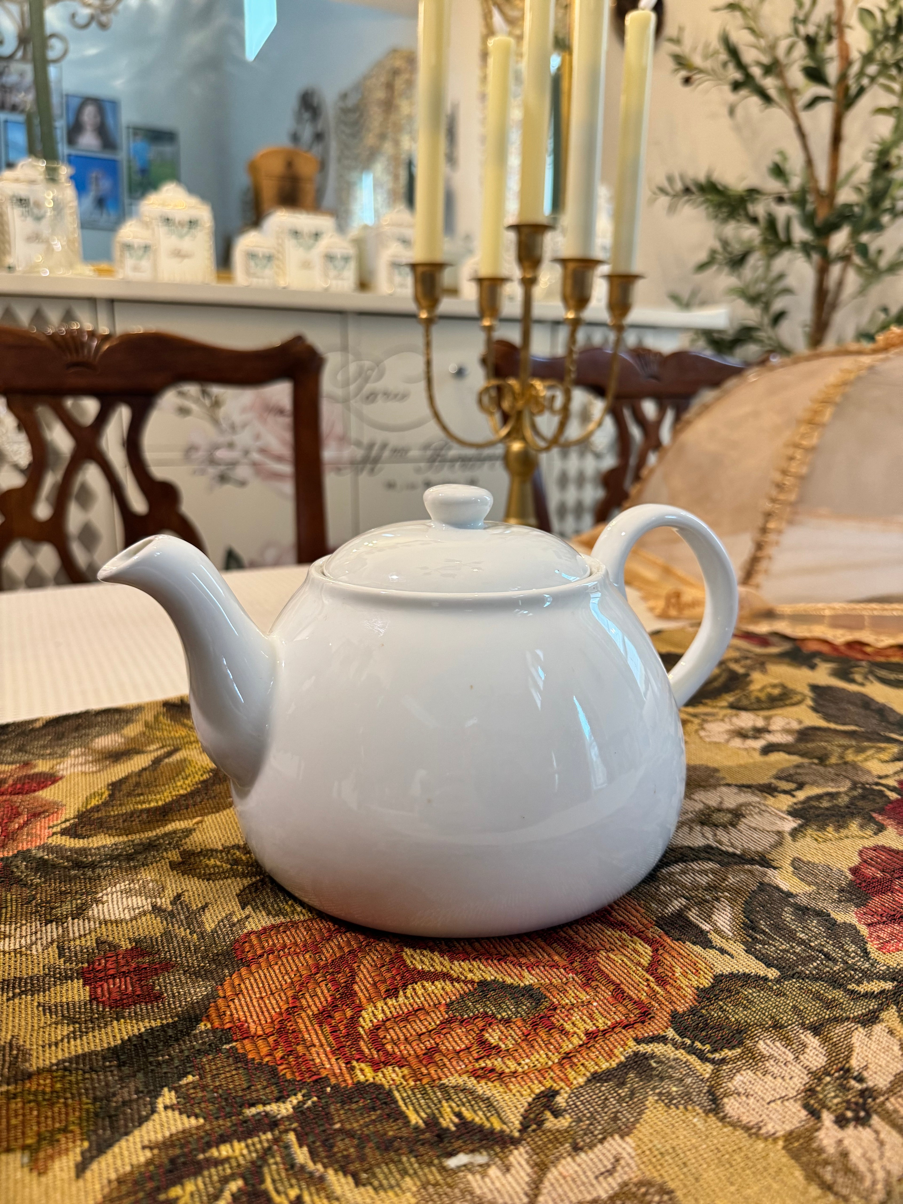 Threshold brand white porcelain teapot.