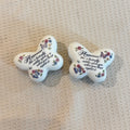 A pair of vintage 1974 Avon "Butterfly Fantasy" porcelain trinket boxes