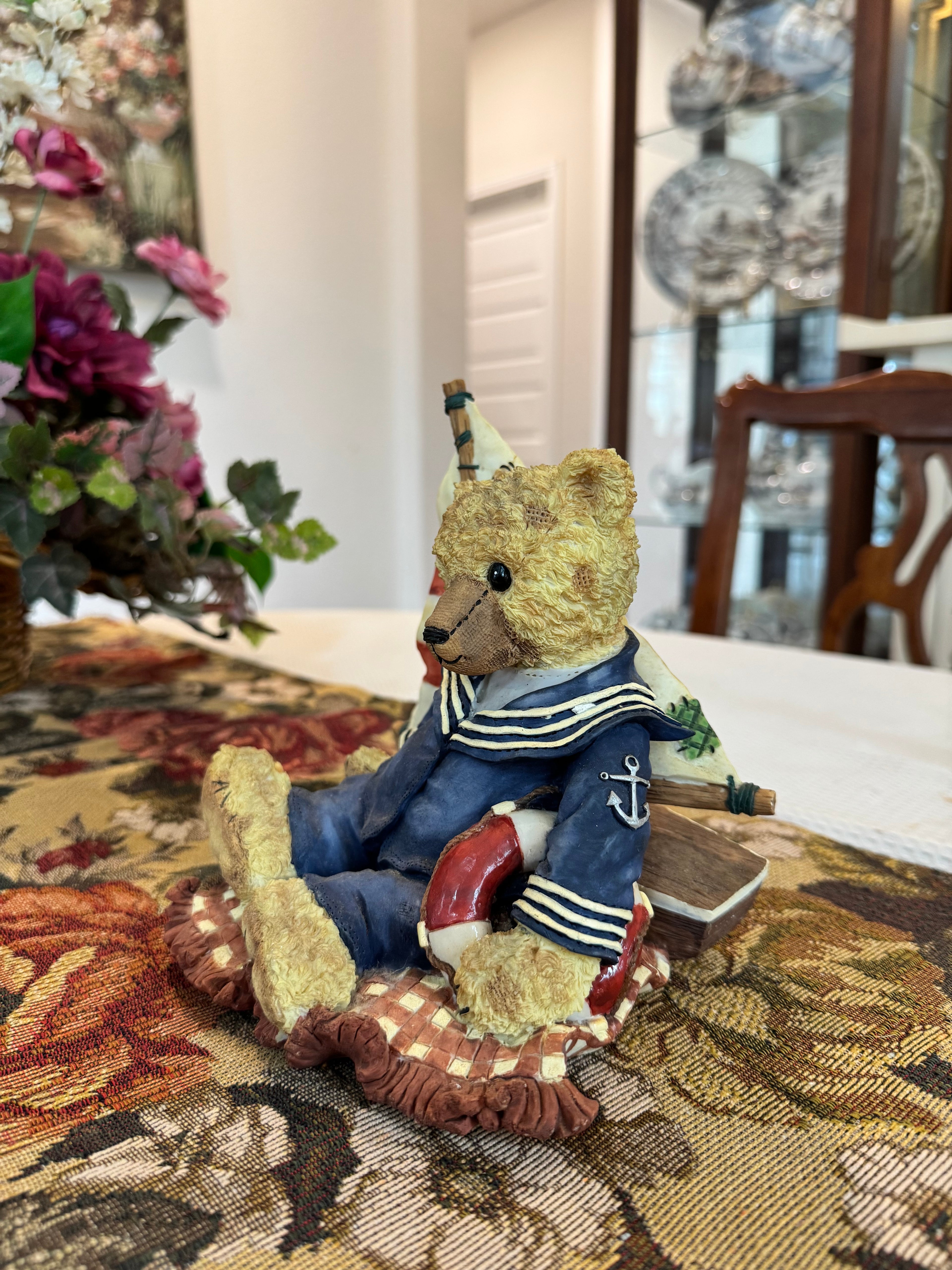 Vintage collectible musical sailor teddy bear figurine featuring a nautical theme.