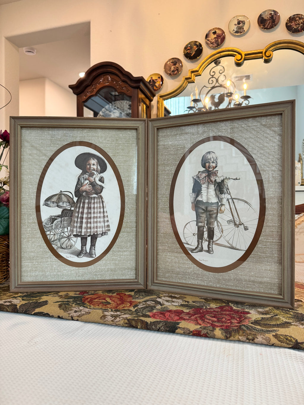 A pair of victorian framed prints boy and girl by artist Joanne Thompson