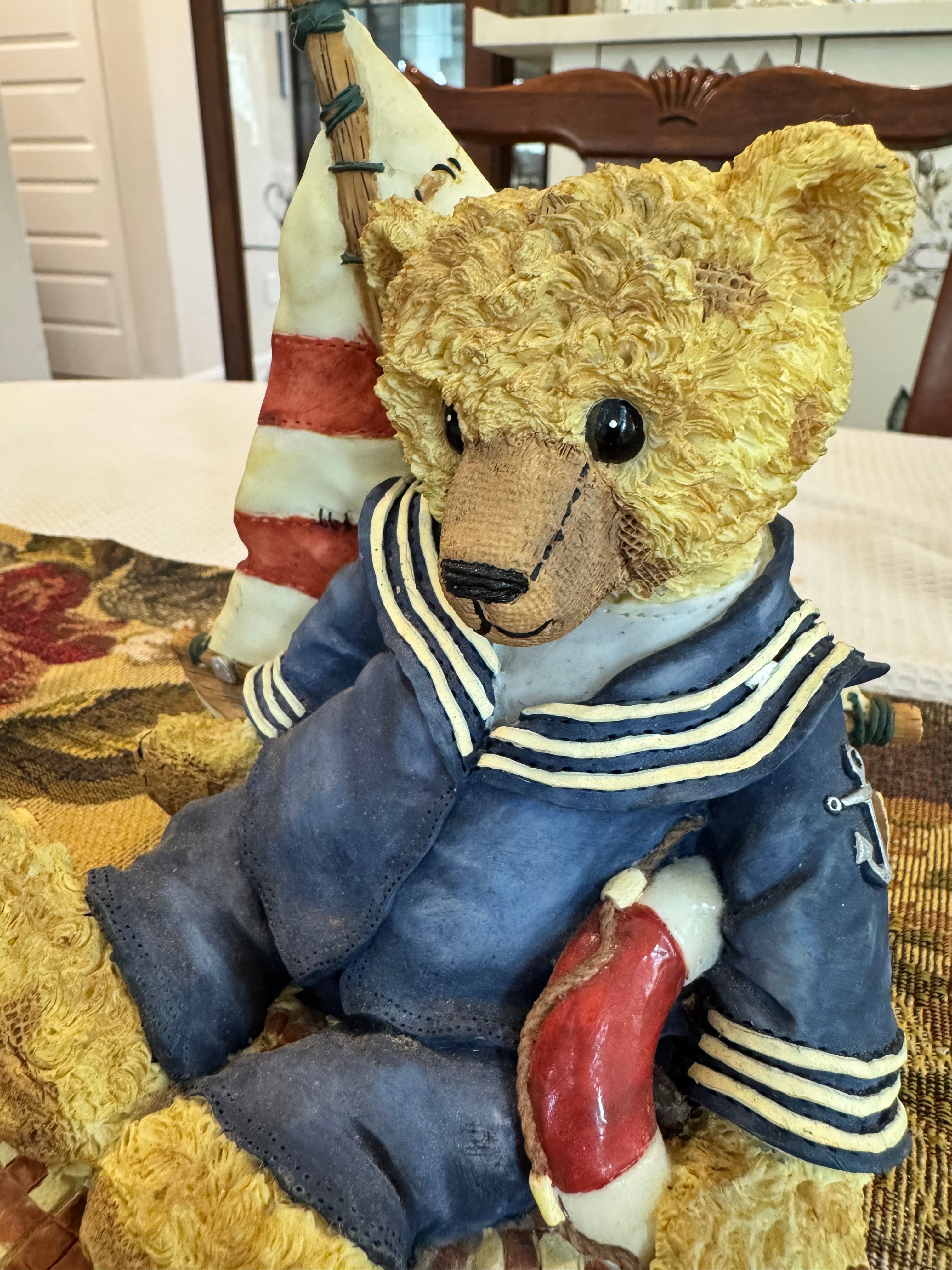 Vintage collectible musical sailor teddy bear figurine featuring a nautical theme.
