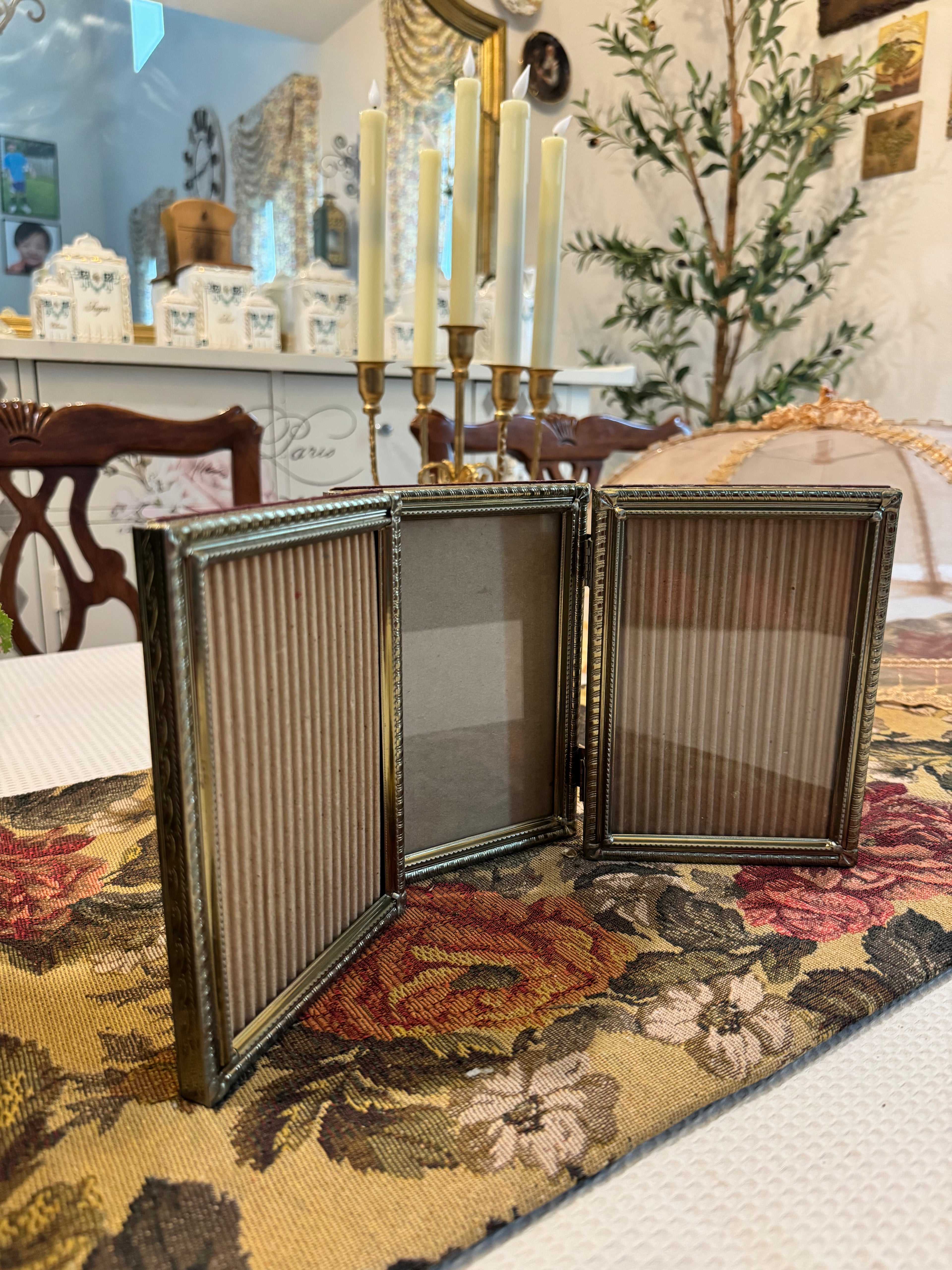 Hinged triple-photo frame