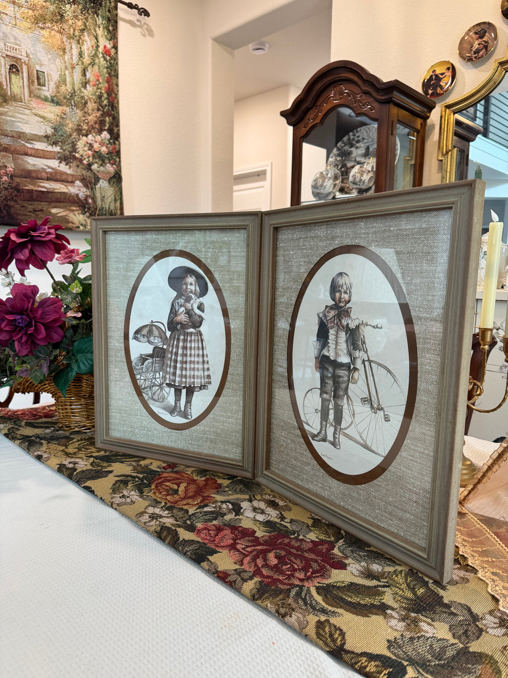 A pair of victorian framed prints boy and girl by artist Joanne Thompson