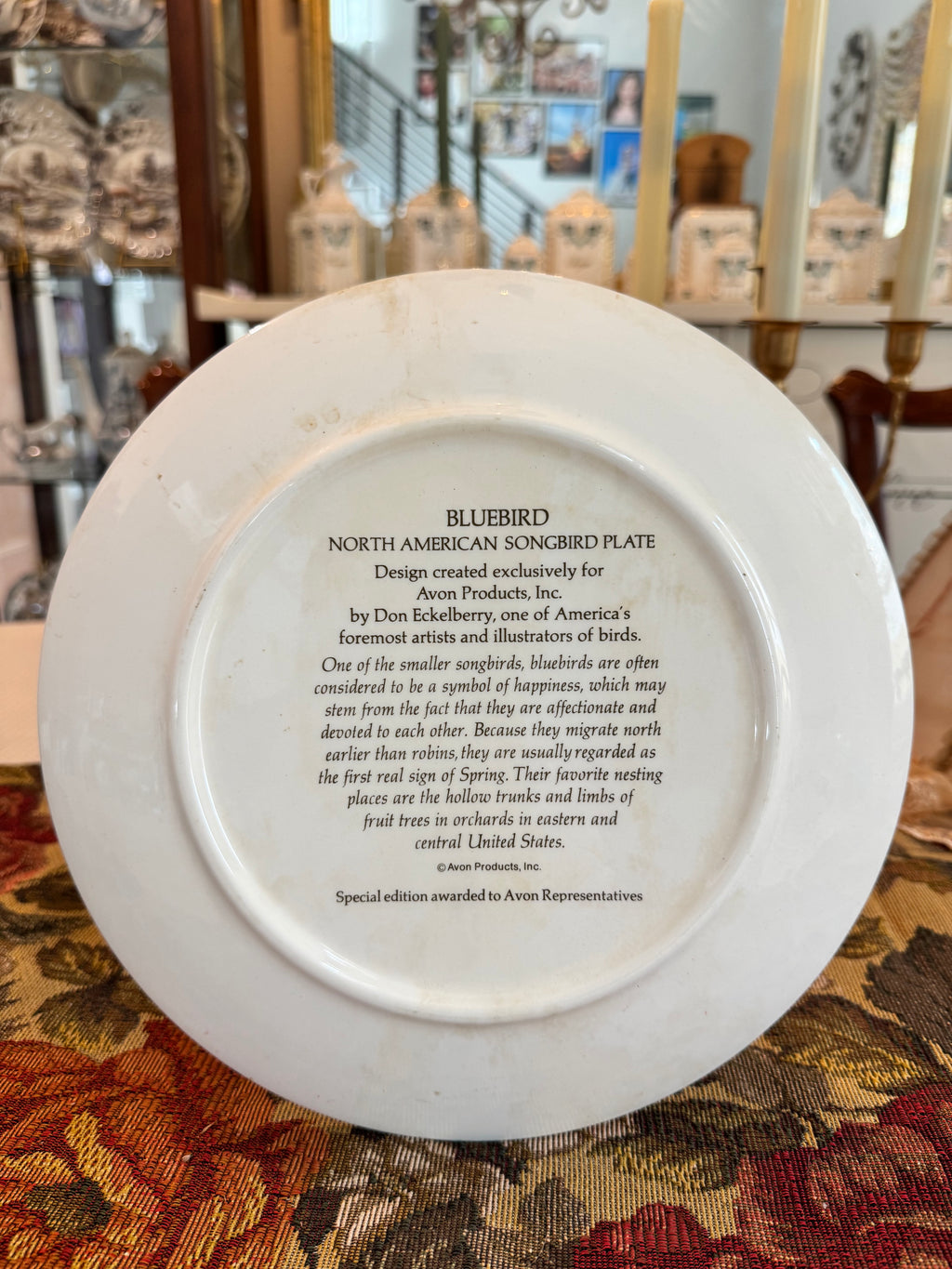 Collectible Avon North American Songbird Plate with a bluebird by artist Don Eckelberry.