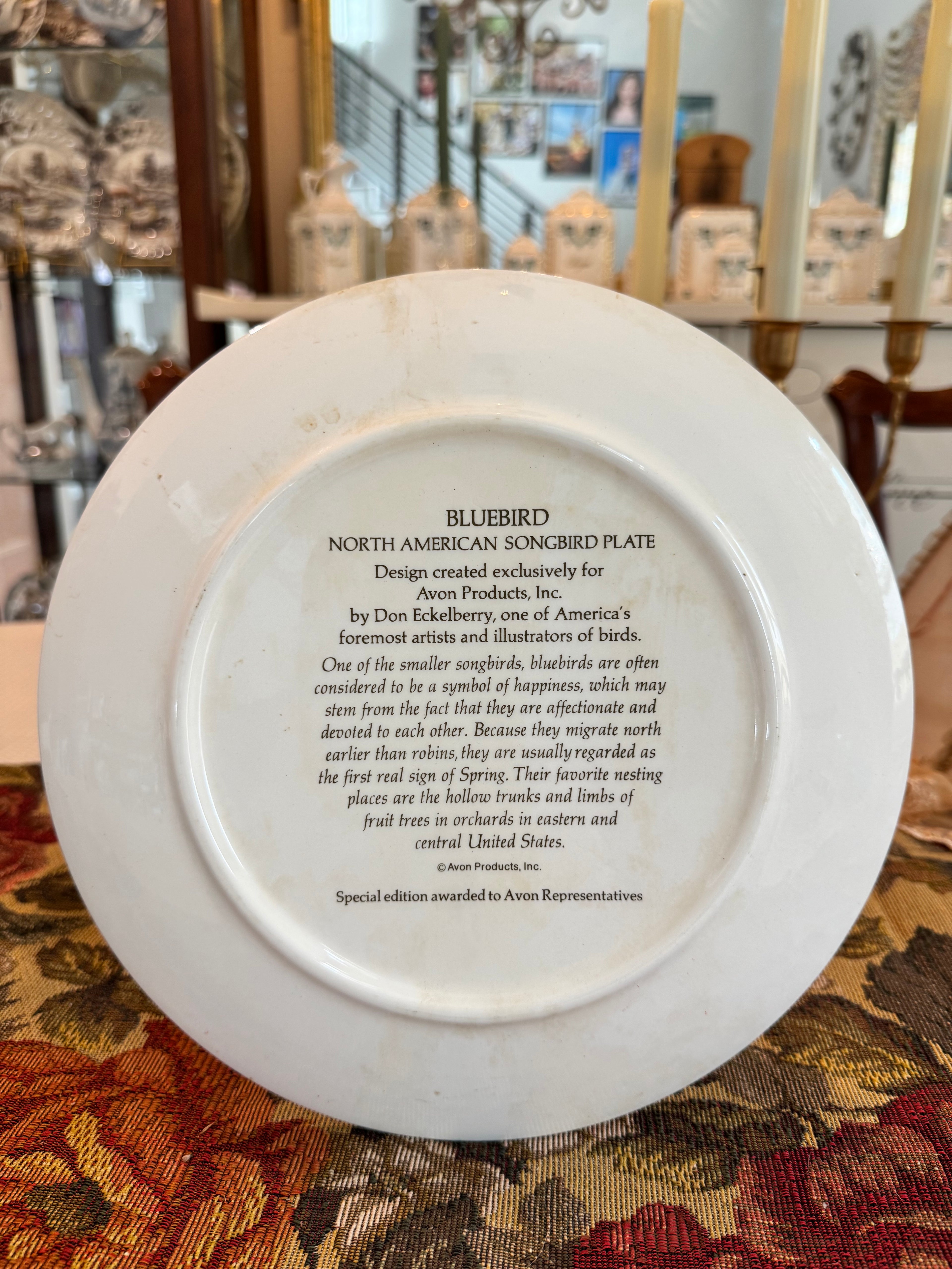 Collectible Avon North American Songbird Plate with a bluebird by artist Don Eckelberry.